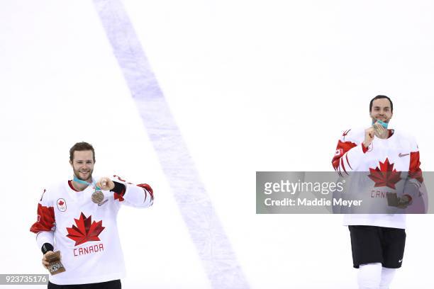 Bronze medal winner Cody Goloubef and Chris Lee of Canada celebrates after defeating Czech Republic 6-4 during the Men's Bronze Medal Game on day...