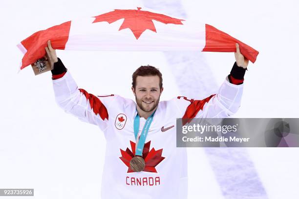 Bronze medal winner Cody Goloubef of Canada celebrates after defeating Czech Republic 6-4 during the Men's Bronze Medal Game on day fifteen of the...