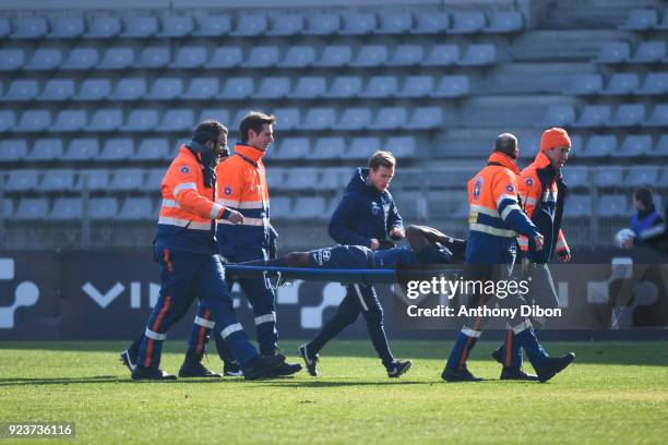 Frederic Bong of PFC leaves the pitch after an injury during the Ligue 2 match between Paris FC and Brest on February 24, 2018 in Paris, France.