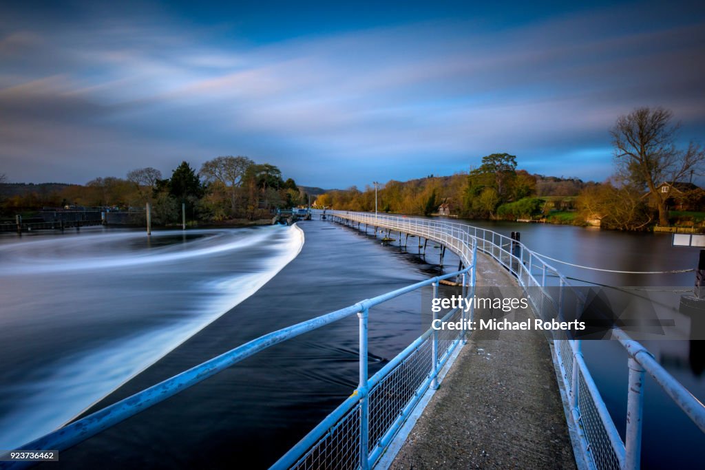 Walkway at Hambleden over weir pool on the river Thames in Henley on Thames