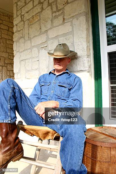 cowboy dozing on porch - cowboy sleeping stock pictures, royalty-free photos & images