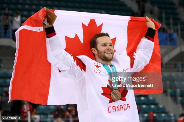 Bronze medal winner Cody Goloubef of Canada celebrates after defeating Czech Republic 6-4 during the Men's Bronze Medal Game on day fifteen of the...