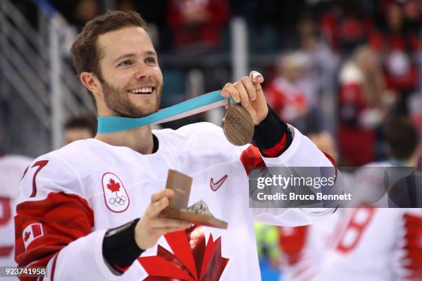 Bronze medal winner Cody Goloubef of Canada celebrates after defeating Czech Republic 6-4 during the Men's Bronze Medal Game on day fifteen of the...