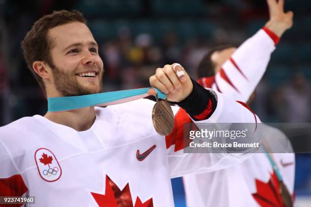 Bronze medal winner Cody Goloubef of Canada celebrates after defeating Czech Republic 6-4 during the Men's Bronze Medal Game on day fifteen of the...