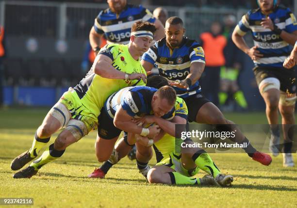 Will Hurrell of Bath Rugby is tacked by Luke James of Sale Sharks during the Aviva Premiership match between Bath Rugby and Sale Sharks at Recreation...