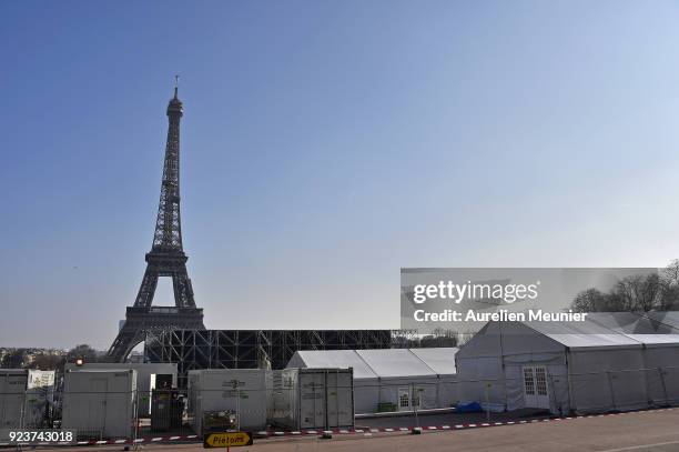 View of the Eiffel Tower as construction of the Yves Saint-Laurent venue prior to their show during Paris Fashion Week on February 24, 2018 in Paris,...