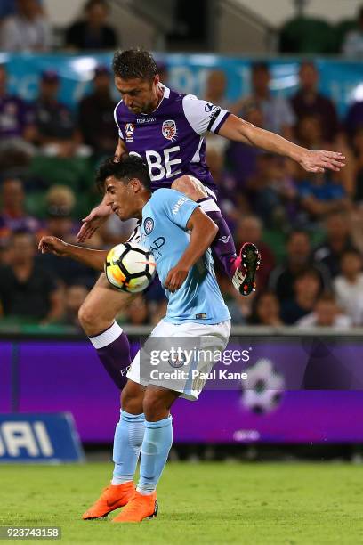 Dino Djulbic of the Glory and Daniel Arzani of Melbourne contest for the ball during the round 21 A-League match between the Perth Glory and...