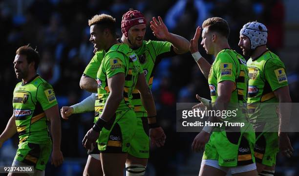 Harry Mallinder of Northampton Saints celebrates after scoring his sides third try during the Aviva Premiership match between Exeter Chiefs and...