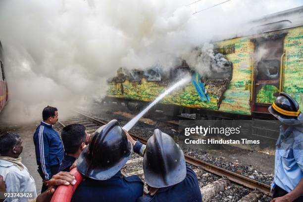 Fire broke out in an empty coach of Pune-New Delhi Duronto Express parked at the yard near Sangam Park, on February 23, 2018 in Pune, India. Fire...