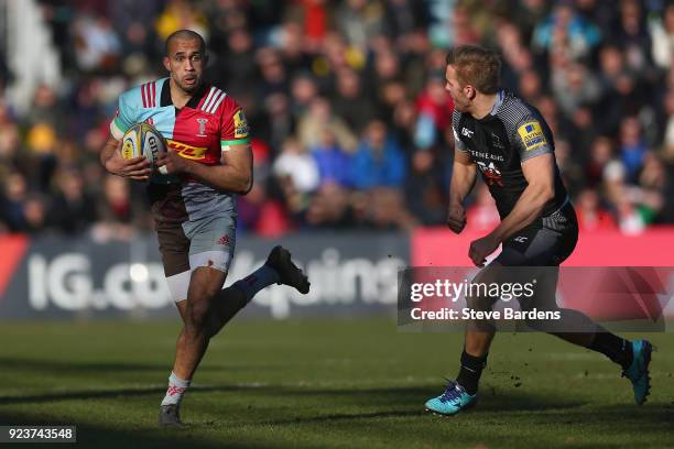 Aaron Morris of Harlequins makes a break during the Aviva Premiership match between Harlequins and Newcastle Falcons at Twickenham Stoop on February...