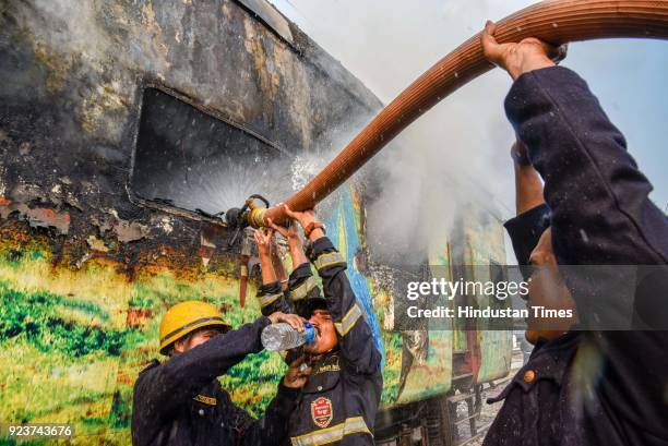 Fire broke out in an empty coach of Pune-New Delhi Duronto Express parked at the yard near Sangam Park, on February 23, 2018 in Pune, India. Fire...