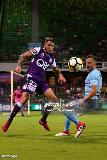 Scott Neville of the Glory and Scott Jamieson of Melbourne contest for the ball during the round 21 A-League match between the Perth Glory and...