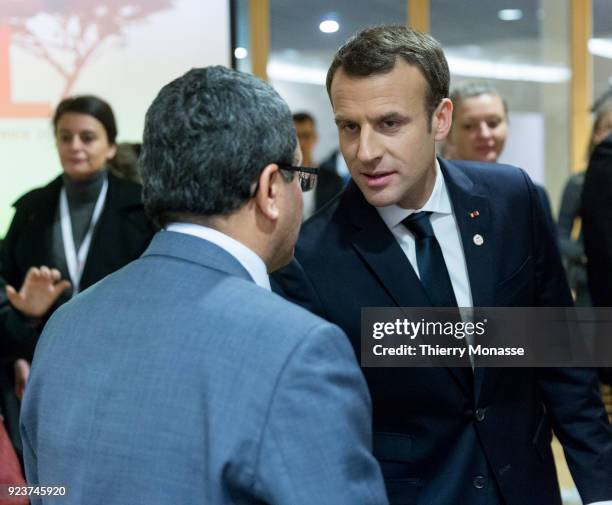 French President Emmanuel Macron is greeting a counterpart during a round table meeting of the EU-Sahel at EU Commission headquarters in Brussels on...