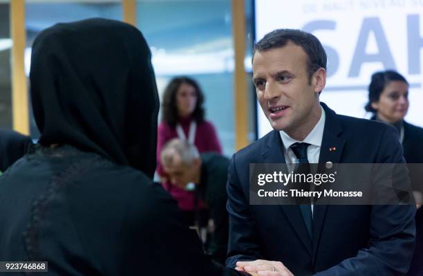 French President Emmanuel Macron is greeting a counterpart during a round table meeting of the EU-Sahel at EU Commission headquarters in Brussels on...