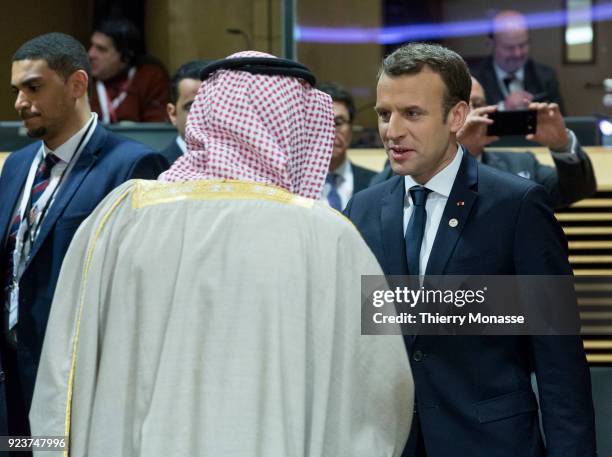 Saudi Minister of Foreign Affairs Adel bin Ahmed Al-Jubeir is talking with the French President Emmanuel Macron during a round table meeting of the...