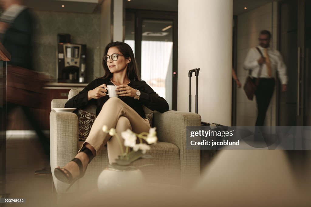 Businesswoman waiting at airport lounge