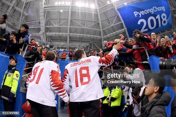 Bronze medal winners Linden Vey and Marc-Andre Gragnani of Canada celebrate with fans after defeating Czech Republic 6-4 during the Men's Bronze...