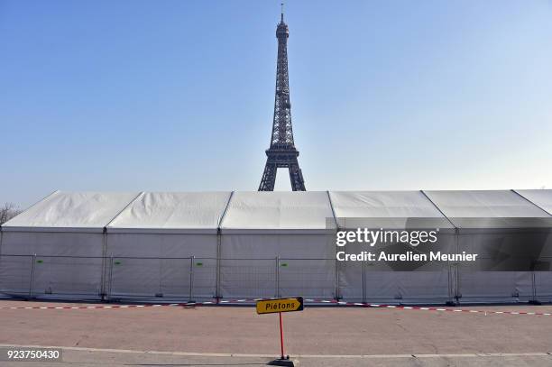 View of the Eiffel Tower as construction of the Yves Saint-Laurent venue prior to their show during Paris Fashion Week on February 24, 2018 in Paris,...