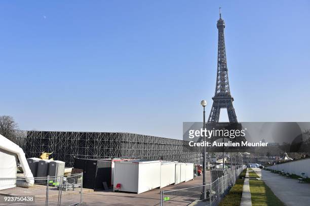 View of the Eiffel Tower as construction of the Yves Saint-Laurent venue prior to their show during Paris Fashion Week on February 24, 2018 in Paris,...