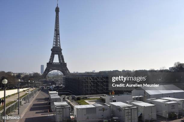 View of the Eiffel Tower as construction of the Yves Saint-Laurent venue prior to their show during Paris Fashion Week on February 24, 2018 in Paris,...