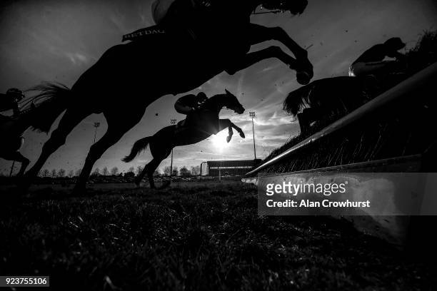 General view as runners clear a fence at Kempton Park racecourse on February 24, 2018 in Sunbury, England.
