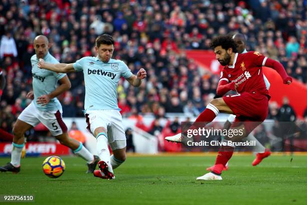 Mohamed Salah of Liverpool shoots and scores his side's second goal during the Premier League match between Liverpool and West Ham United at Anfield...