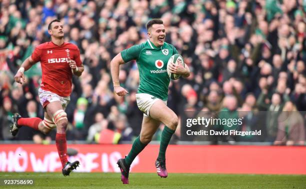 Dublin , Ireland - 24 February 2018; Jacob Stockdale of Ireland on his way to scoring his side's fifth try during the NatWest Six Nations Rugby...