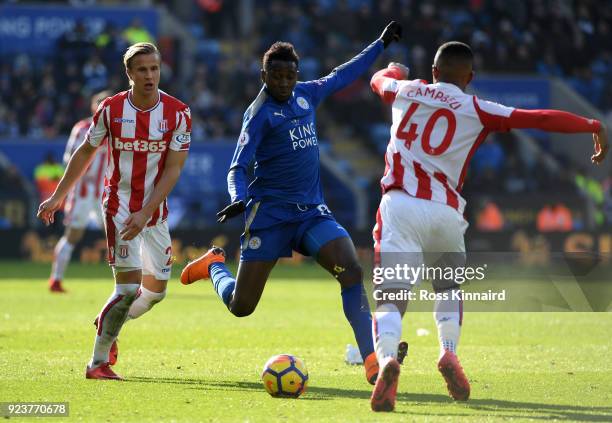 Wilfred Ndidi of Leicester City is challenged by Tyrese Campbell of Stoke City during the Premier League match between Leicester City and Stoke City...