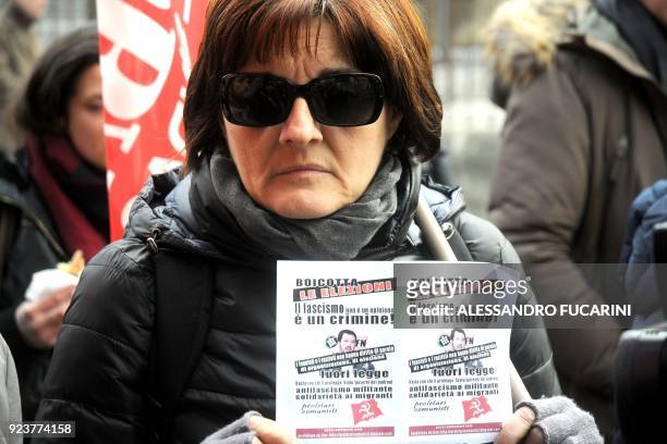 Woman holds a sign reading " Fascism is not an opinion, it is a crime" during a demonstration gainst the Italian extreme-right Forza Nuova party...