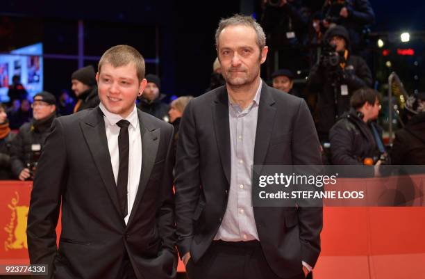 French director Cedric Kahn and French actor Anthony Bajon arrive on the red carpet before the awards ceremony of the 68th edition of the Berlinale...