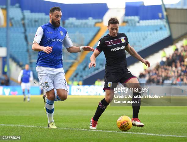 Sheffield Wednesday's Atdhe Nuhiu and Aston Villa's James Chester during the Sky Bet Championship match between Sheffield Wednesday and Aston Villa...