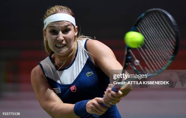 Slovakia's Dominika Cibulkova plays a backhand against Germany's Mona Barthel during their semi-final match of the WTA Hungarian Open Ladies' tennis...