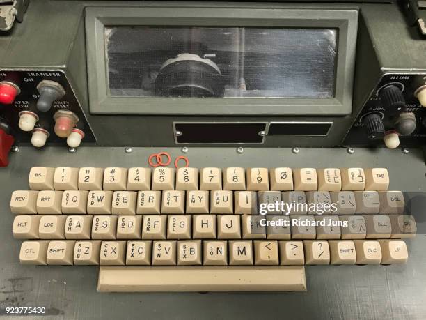 retro computer keyboard with glass viewing window and analog switches in o.d. green casing - 1950 1960 stock pictures, royalty-free photos & images