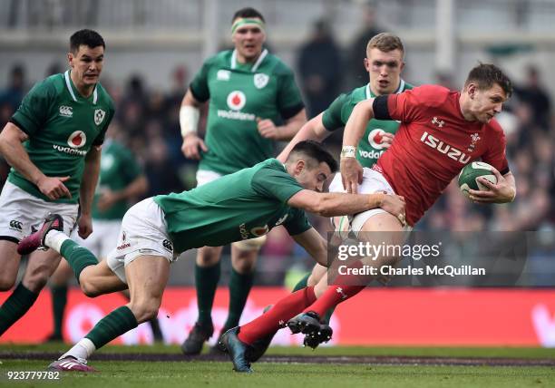 Conor Murray of Ireland and Dan Biggar of Wales during the Six Nations Championship rugby match between Ireland and Wales at Aviva Stadium on...