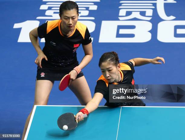 Ning DING of China and Shiwen LIU of China during 2018 International Table Tennis Federation World Cup match between Ning DING of China and Shiwen...