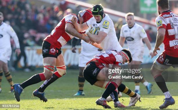 James Gaskell of Wasps is tackled during the Aviva Premiership match between Gloucester Rugby and Wasps at Kingsholm Stadium on February 24, 2018 in...