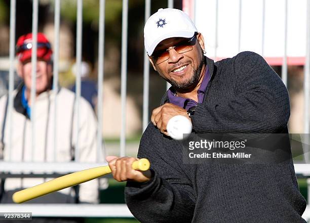 Major League Baseball player Gary Sheffield hits Wiffle ball pitches from former MLB pitcher Greg Maddux during the 2009 Maddux Harmon Celebrity...