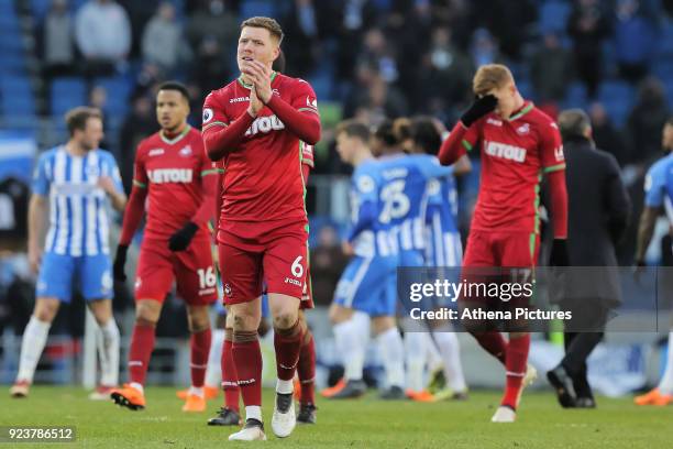 Alfie Mawson of Swansea City thanks away supporters during the Premier League match between Brighton and Hove Albion and Swansea City and at the Amex...