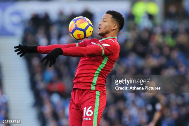 Martin Olsson of Swansea City controls the ball with his chest during the Premier League match between Brighton and Hove Albion and Swansea City and...