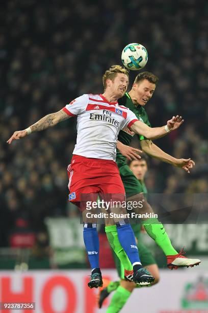 Andre Hahn of Hamburg fights for the ball with Niklas Moisander of Bremen during the Bundesliga match between SV Werder Bremen and Hamburger SV at...