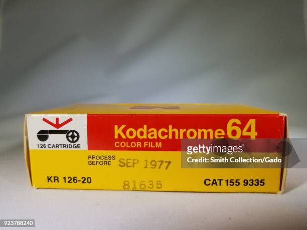 Close-up of Kodak Kodachrome 64 slide film cartridge, with expiration date showing September 1977, a classic slide film in the 126 format, used with...