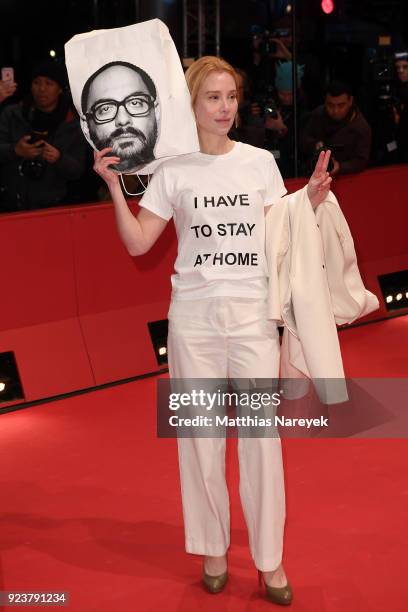 Franziska Petri holds a picture of Russian director Kirill Serebrennikov during the closing ceremony during the 68th Berlinale International Film...