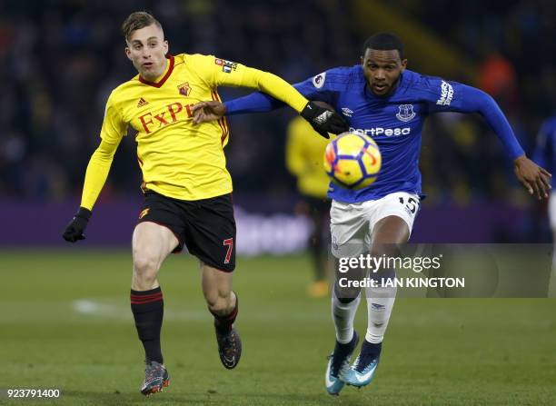 Watford's Spanish midfielder Gerard Deulofeu vies with Everton's Dutch defender Cuco Martina during the English Premier League football match between...