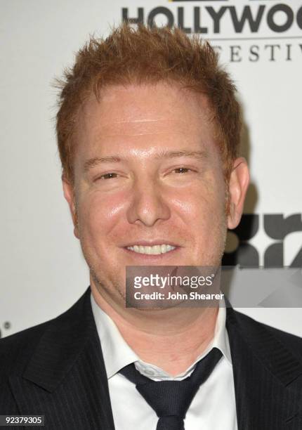 Producer Ryan Kavanaugh poses with the Producer of the Year Award in the press room during the 13th annual Hollywood Awards Gala Ceremony held at The...