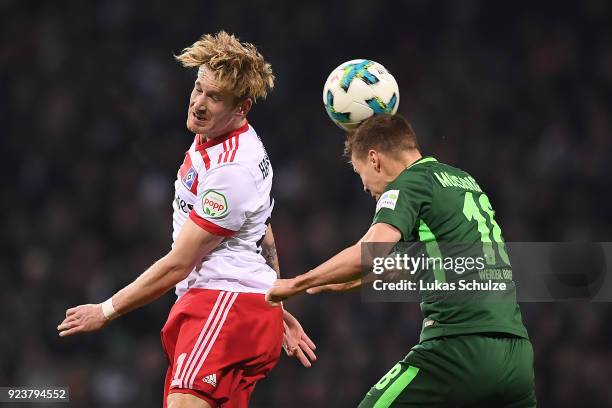 Andre Hahn of Hamburg fights for the ball with Niklas Moisander of Bremen during the Bundesliga match between SV Werder Bremen and Hamburger SV at...