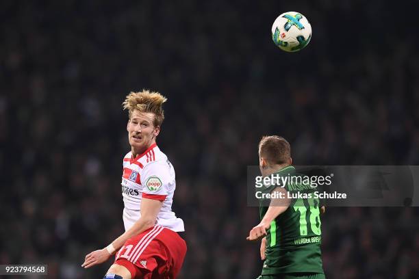 Andre Hahn of Hamburg fights for the ball with Niklas Moisander of Bremen during the Bundesliga match between SV Werder Bremen and Hamburger SV at...