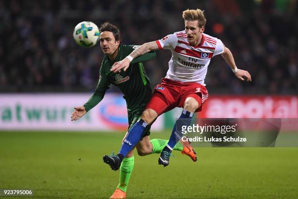 Thomas Delaney of Bremen fights for the ball with Andre Hahn of Hamburg during the Bundesliga match between SV Werder Bremen and Hamburger SV at...