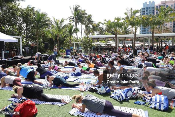 Guests attend illy At Buddhas And Bellinis #livehapilly At SOBEWFF at Loews Miami Beach on February 24, 2018 in Miami Beach, Florida.