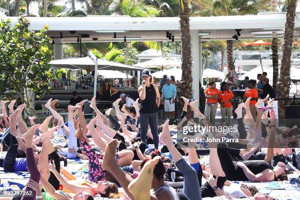 Dawn Feinberg leads yoga at illy At Buddhas And Bellinis #livehapilly At SOBEWFF at Loews Miami Beach on February 24, 2018 in Miami Beach, Florida.