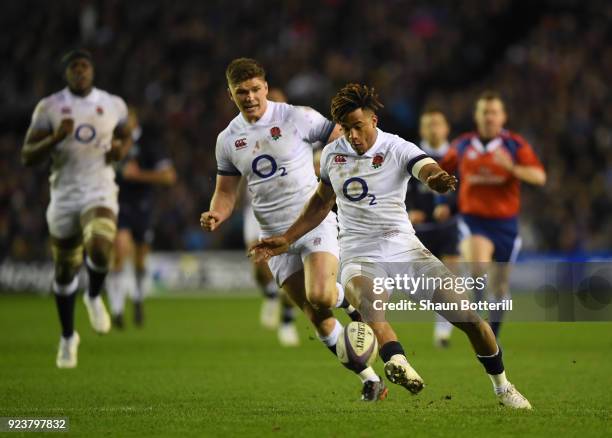 Anthony Watson of England kicks the ball during the NatWest Six Nations match between Scotland and England at Murrayfield on February 24, 2018 in...
